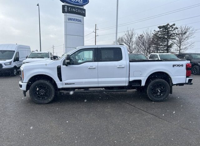 
								New 2023 Ford Super Duty F-350 SRW LARIAT CREW CAB 4WD W/ BLACK APPEARANCE PKG, LARIAT ULTIMATE PKG, FX4 PKG AND TWIN PANEL MOONROOF full									