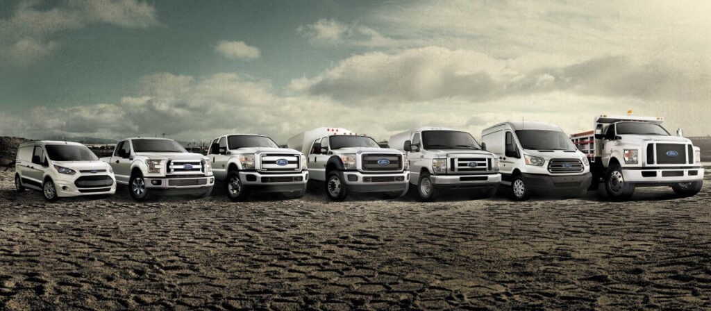 fleet of commercial ford vehicles on offroad photography set